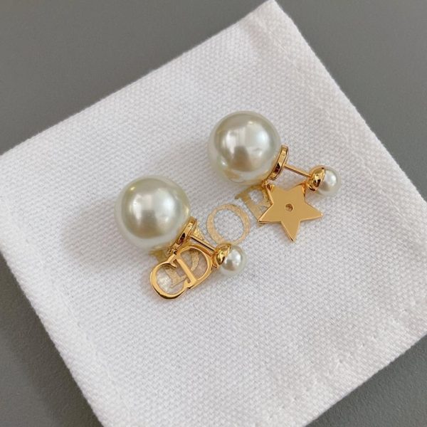 Boucles d'oreilles Dior étoile gauche et droite