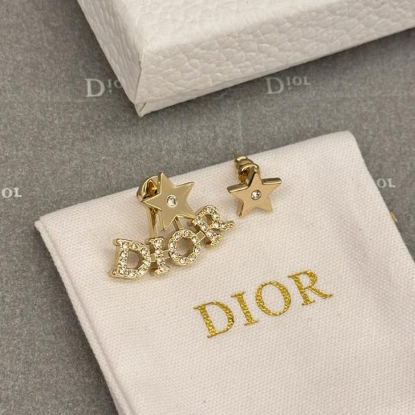 Boucles d'oreilles asymétriques étoile lettre Dor