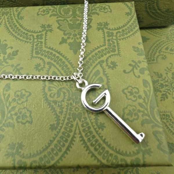 Collier clé brillant Gucci