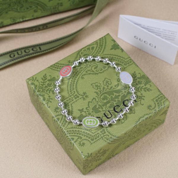Bracelet en émail coloré avec perles double g Gucci
