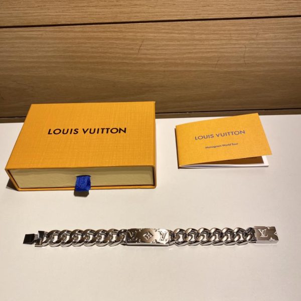 LOUIS VUITTON partie incurvée avec lettres gravées au laser