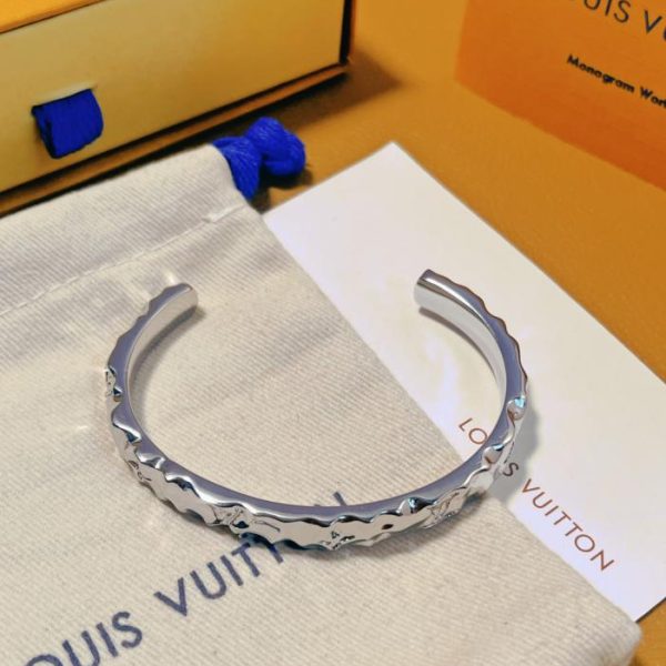 Ensemble sculpté monogramme LOUIS VUITTON