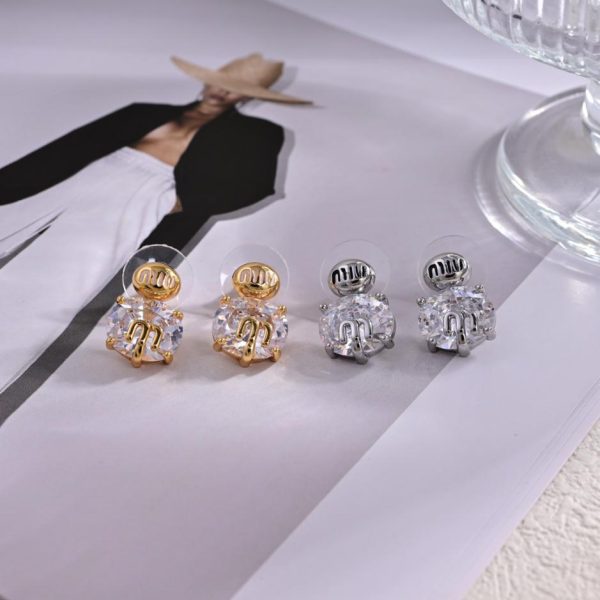 Boucles d'oreilles lettre Miu Miu