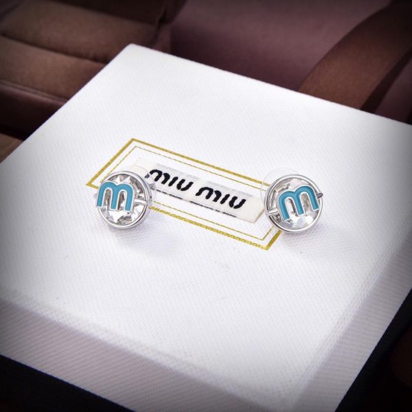 Boucles d'oreilles lettre Miu Miu