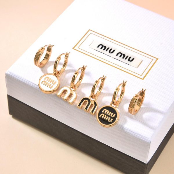 Boucles d'oreilles pendantes huile Miu Miu