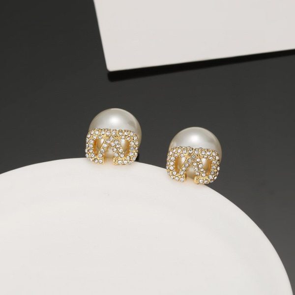 Boucles d'oreilles perles Valentino