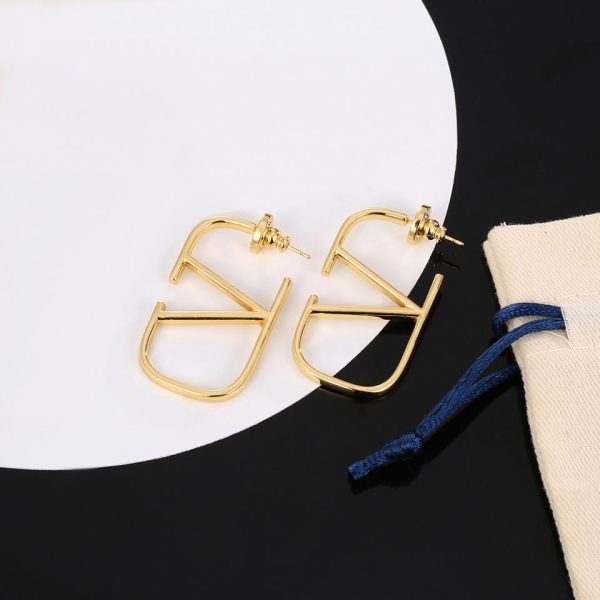 Boucles d'oreilles en forme de V avec logo Valentino