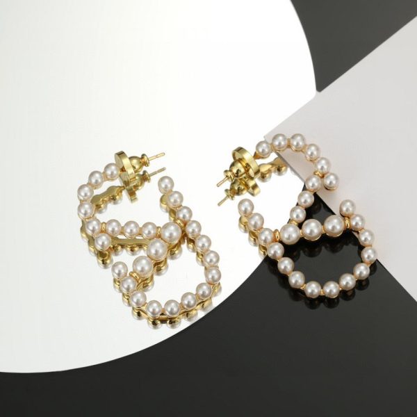Boucles d'oreilles en forme de V avec logo Valentino