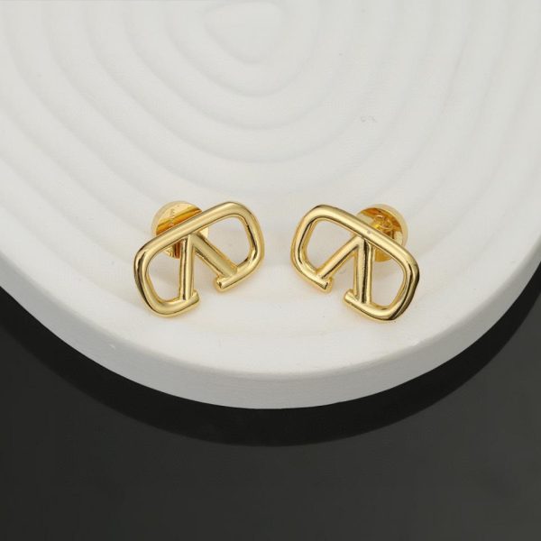 Boucles d'oreilles en forme de V avec logo Valentino