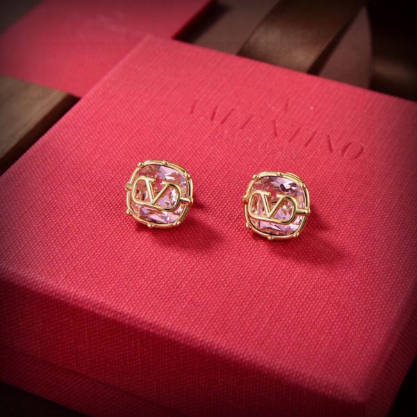 Nouvelles boucles d'oreilles Valentino
