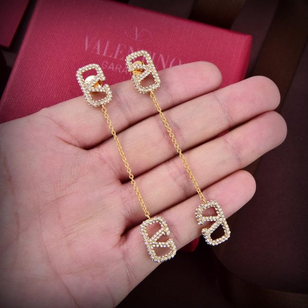 Nouvelles boucles d'oreilles Valentino