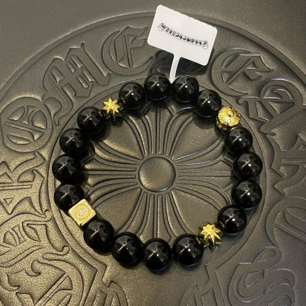 Bracelet croix multi-éléments en or et onyx noir Chrome Hearts
