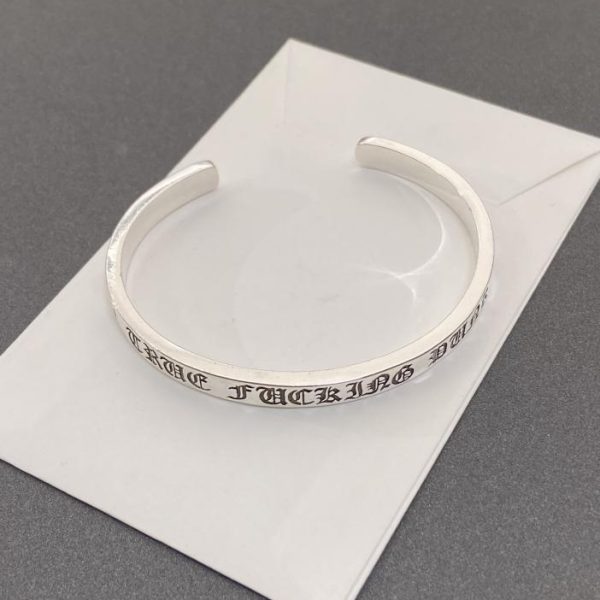 Bracelet croix coeurs chromés
