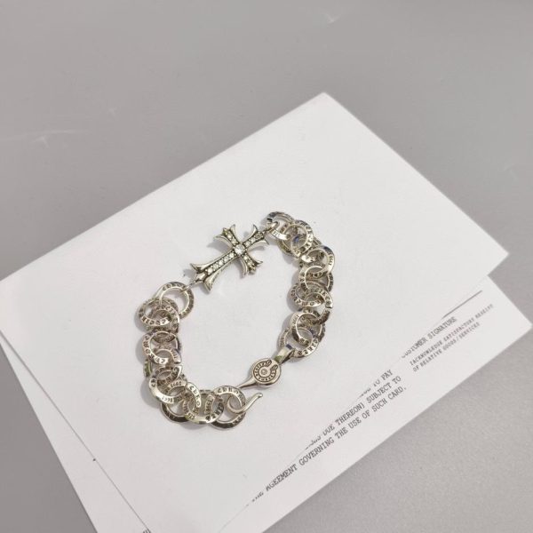 Bracelet croix coeurs chromés