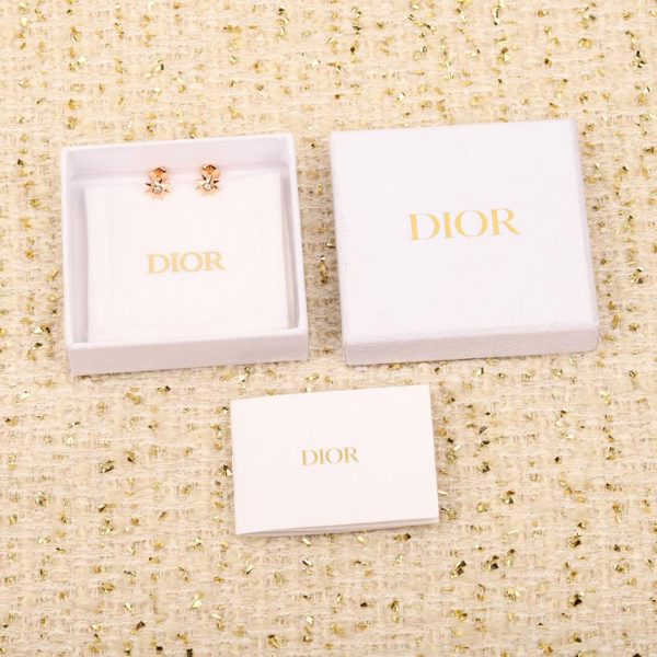 Boucles d'oreilles étoile à huit branches Dior