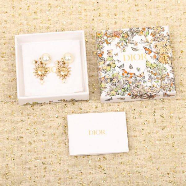 Boucles d'oreilles neuves totem soleil D24