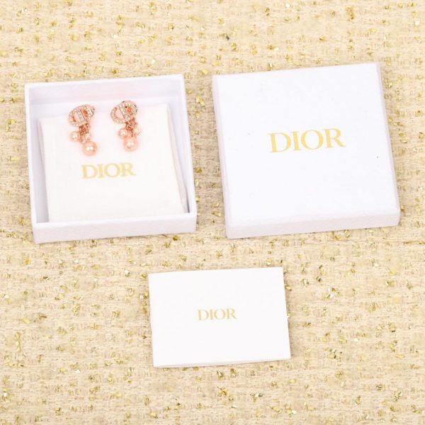 Boucles d'oreilles Dior trois perles