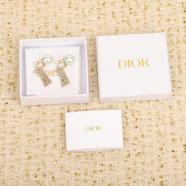 Boucles d'oreilles Dior pentagramme en perles