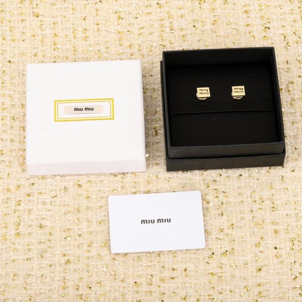 Oreilles Miu Miu