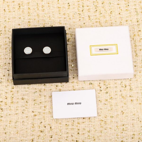 Oreilles Miu Miu