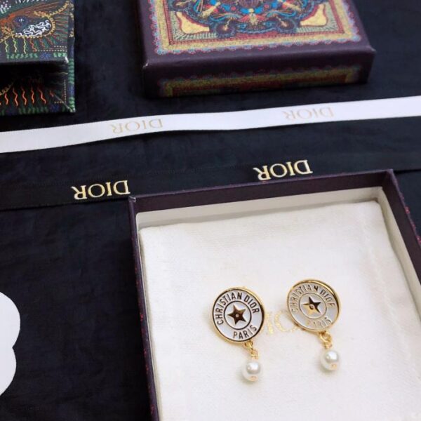 Boucles d'oreilles cd neuves Dior (D65D)
