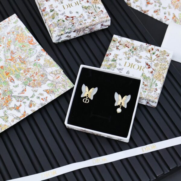 Boucles d'oreilles papillon en résine Dior (EAFB)