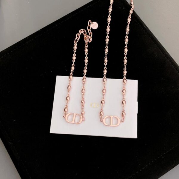  Collier bracelet en perles métalliques 65 Dior cd (A2C2)