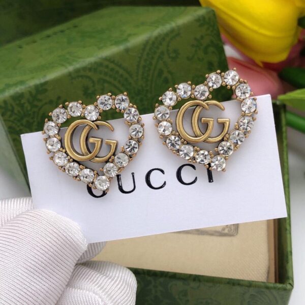 Gucci nouvelles boucles d'oreilles double G love (67CE)