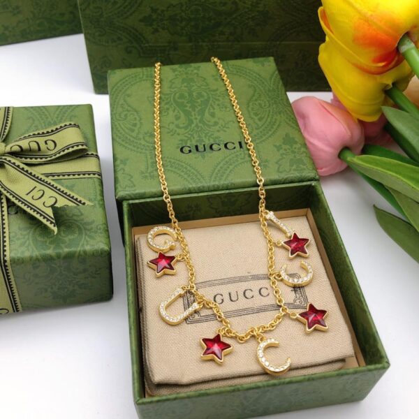 Gucci nouveau collier double étoile G (385B)