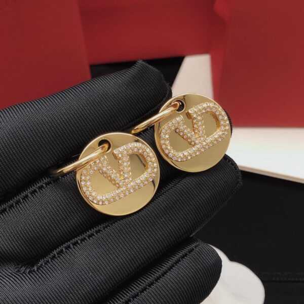 Boucles d'oreilles et crochets d'oreilles en forme de pièce d'or Valentino (82FF)