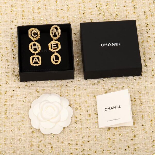 Boucles d'oreilles Chanel losange double C pendentif 5 lettres