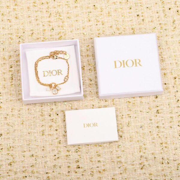 Bracelet Dior une perle et deux diamants