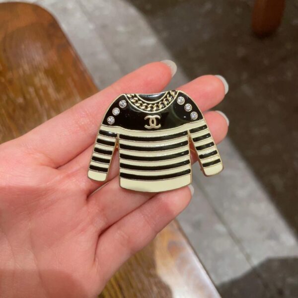 Broche double C Chanel (1BC6)