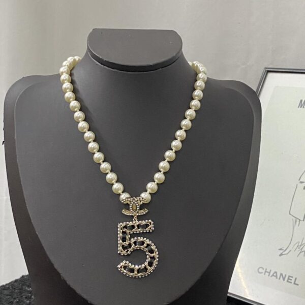 Collier Chanel pull chaîne collier de perles n°5 collier en cuir strass (6403)