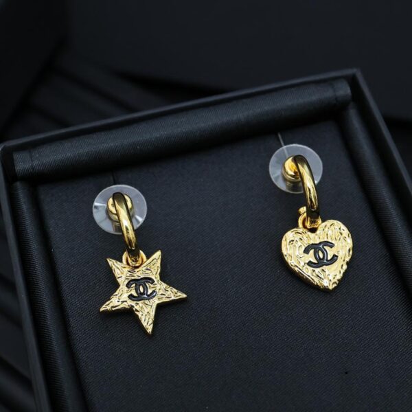 Boucles d'oreilles amour lave dorée Chanel (ACF8)