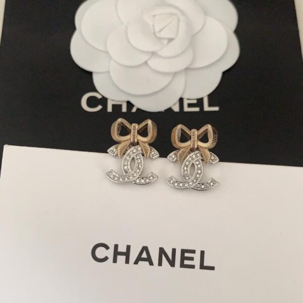 Chanel dernières boucles d'oreilles à nœud bicolore (2E55)