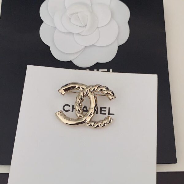Chanel dernière broche torsadée en or clair (5E4A)