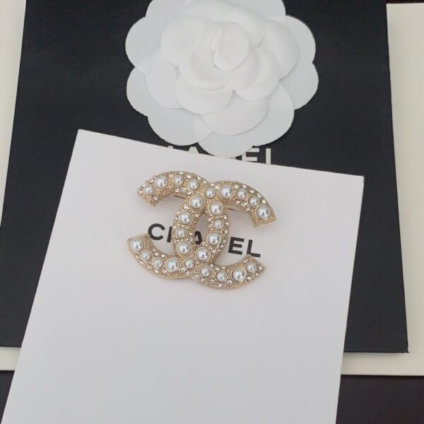 Chanel nouvelle broche centenaire (5FC0)