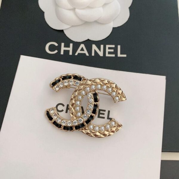 Chanel nouvelle broche cc en perles de cuir noir (2F3D)