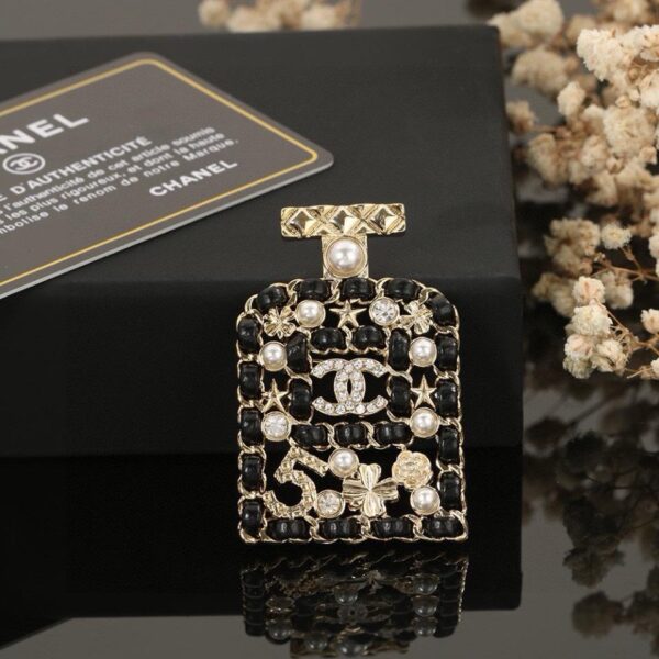 Chanel nouvelle bouteille de parfum tissée broche en cuir noir (5FC3)