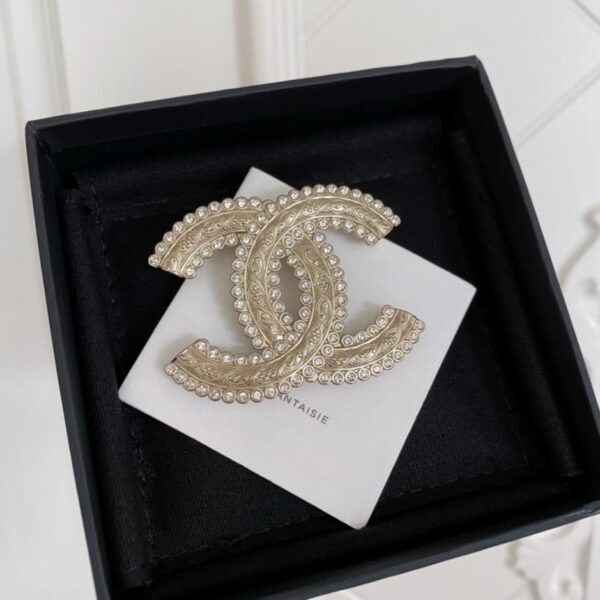 Broche double C vintage en relief Chanel (2549)