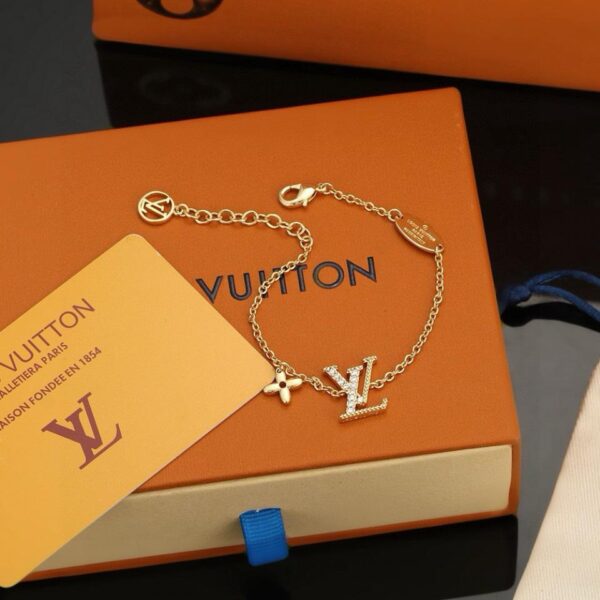 Bracelet avec lettres dorées Louis Vuitton (6D8C)