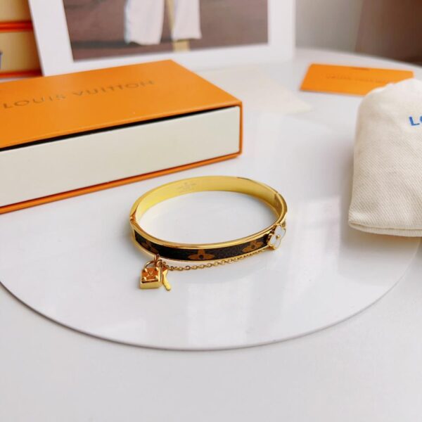 Bracelet en métal cousu presbytie vintage Louis Vuitton (A362)