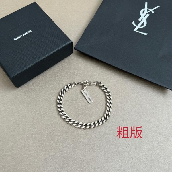 Bracelet fait main Yves Saint Laurent en laiton d'origine (EE5KT)