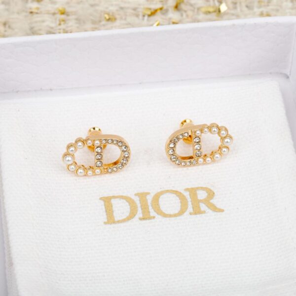 Boucles d'oreilles Dior CD (UGR16) - Moitié diamant, moitié perle